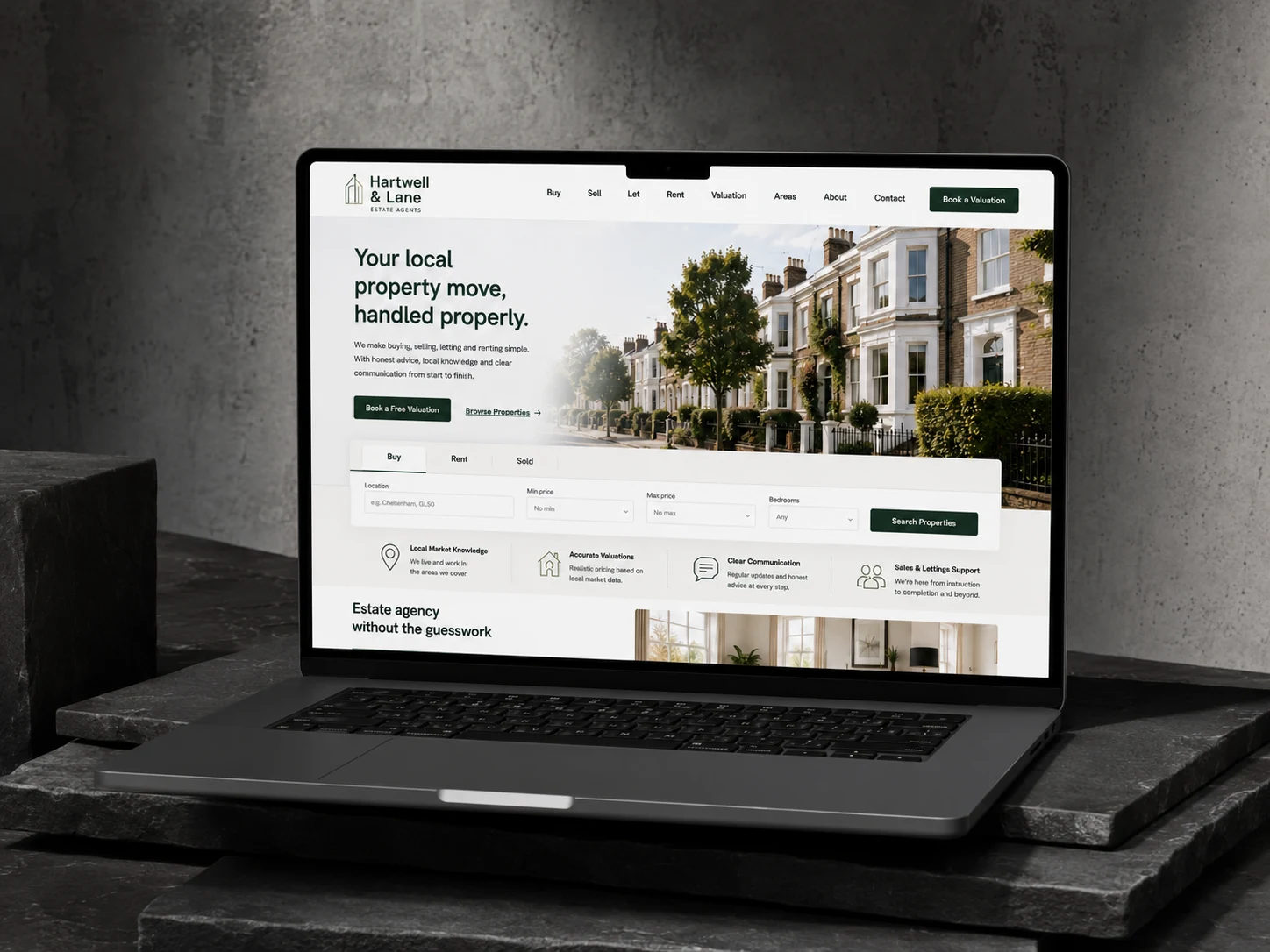 Hartwell & Lane estate agency website mockup